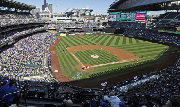 Safeco Field's netting behind home plate will extend from the end of each dugout. (AP)...