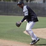 Seattle Seahawks NFL football team quarterback Russell Wilson does drills at New York Yankees baseball spring training camp, Monday, Feb. 26, 2018, in Tampa, Fla. (AP Photo/Lynne Sladky)