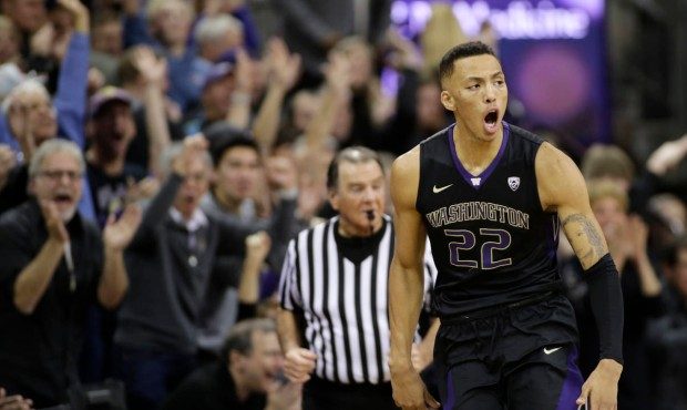 Dominic Green's buzzer beater lifted the Huskies to a huge win over No. 9 Arizona. (AP)...