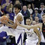 Washington's Matisse Thybulle, left, leaps to steal the ball on a throw intended for Oregon State's Tres Tinkle (3) during the second half of an NCAA college basketball game Thursday, March 1, 2018, in Seattle. Washington won 79-77. (AP Photo/Elaine Thompson)