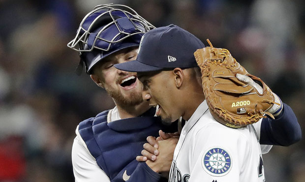 Mike Marjama shook off a hand injury and caught all of the Mariners' win Thursday. (AP)...