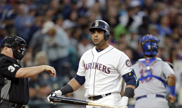 Nelson Cruz exited Tuesday's Mariners loss to the Rockies with a quad strain. (AP)...