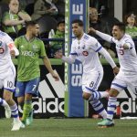 Montreal Impact forward Jeisson Vargas, second from right, celebrates with teammates after he scored a goal against the Seattle Sounders with an assist from Ignacio Piatti, left, during the second half of an MLS soccer match, Saturday, March 31, 2018, in Seattle. The Impact won 1-0. (AP Photo/Ted S. Warren)