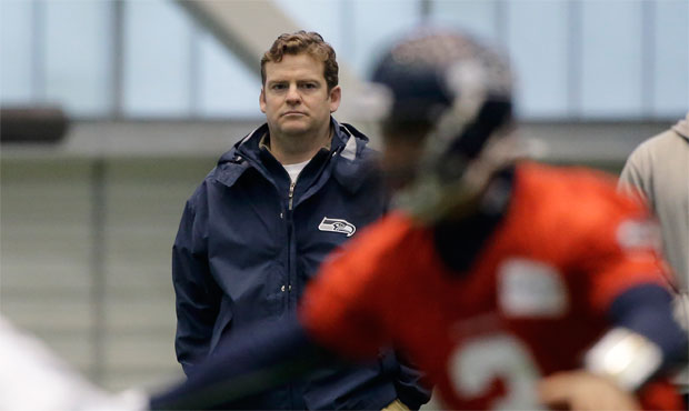 John Schneider may be scouting for a cheaper replacement for QB Russell Wilson. (AP)...