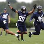 Seattle Seahawks wide receiver Doug Baldwin (89) and fullback Tre Madden (38) run as wide receiver Keenan Reynolds, left, runs with the ball during NFL football practice, Thursday, May 24, 2018, in Renton, Wash. (AP Photo/Ted S. Warren)