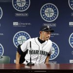 
              Seattle Mariners outfielder Ichiro Suzuki sits and waits for American reporters to depart and members of the Japanese media to arrive, Thursday, May 3, 2018, in Seattle. Suzuki was released Thursday by the Mariners and is shifting into a front office role with the team, although he is not completely shutting the door on playing again. (AP Photo/Ted S. Warren)
            