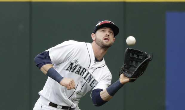 Mariners OF Mitch Haniger could have used some help with a catch of a foul ball Saturday. (AP)...