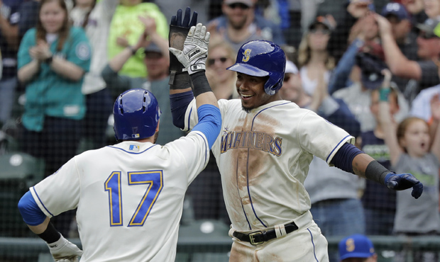 Mitch Haniger and Jean Segura have been the Mariners' most clutch hitters. (AP)...