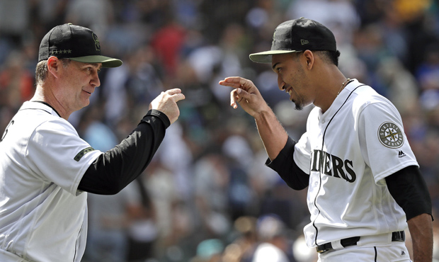 Edwin Díaz is well on his way to making Mariners manager Scott Servais get a new haircut. (AP)...