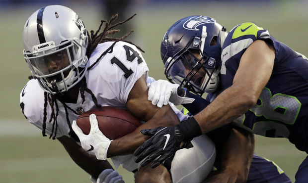 Keon Hatcher and the Raiders handed the Seahawks their fourth preseason loss. (AP)...