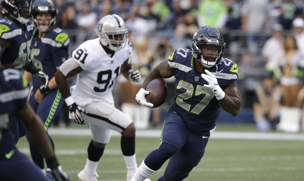 Mike Davis is one of five running backs the Seahawks kept on their 53-man roster. (AP)...