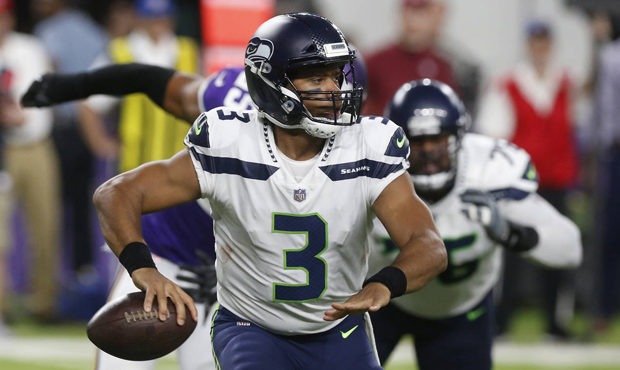 Will the Seahawks have to rely on Russell Wilson again in the running game? (AP)...
