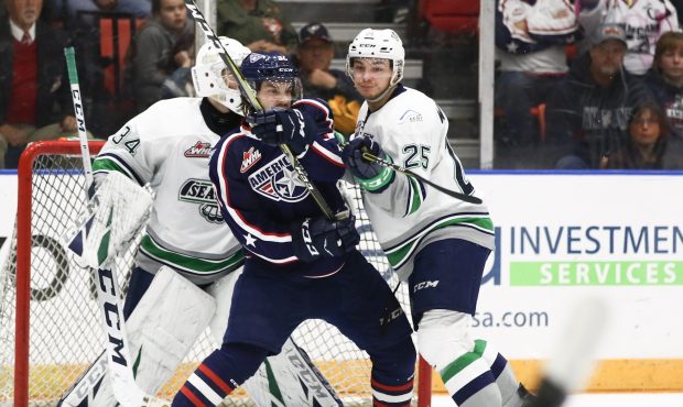 Seattle defenseman Owen Williams fights for position in front of the Thunderbirds net Friday night ...