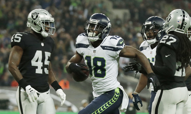 Jaron Brown's 5-yard TD catch put the Seahawks up 7-0 in London. (AP)...