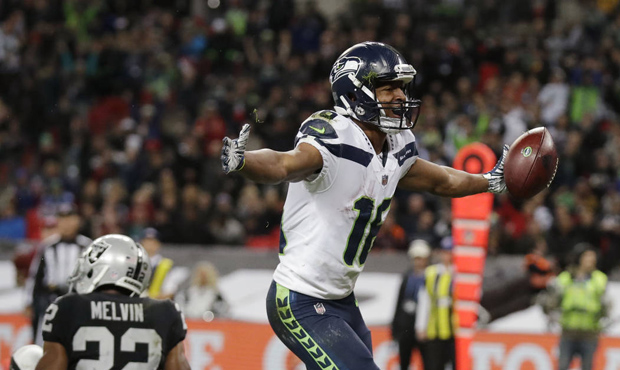 Tyler Lockett caught one of three Seahawks TD passes in their win over the Raiders. (AP)...