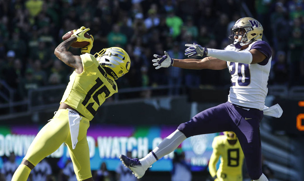 Oregon knocked off the UW Huskies 30-27 in overtime in a big Pac-12 matchup Saturday. (AP)...