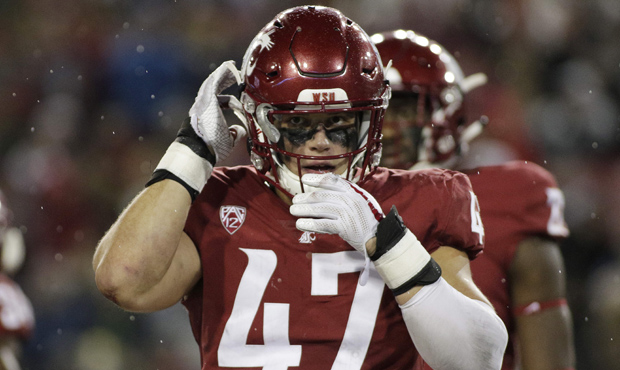 Peyton Pelluer is part of the reason WSU has reached No. 8 in the CFP poll. (AP)...