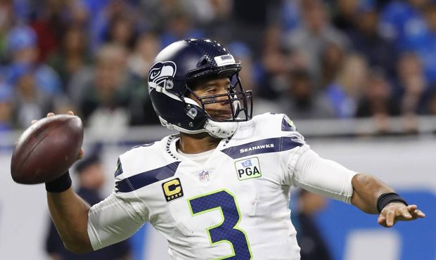 Seattle Seahawks quarterback Russell Wilson prepares to throw during the first half of an NFL footb...