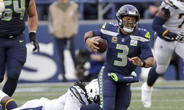 Russell Wilson and the Seahawks had a shot at tying the Chargers with no time left. (AP)...