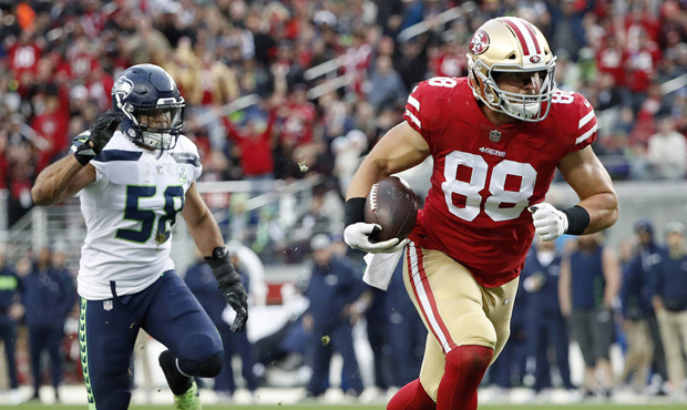 Garrett Celek and fellow 49ers tight end George Kittle gave the Seahawks' defense issues. (AP)...