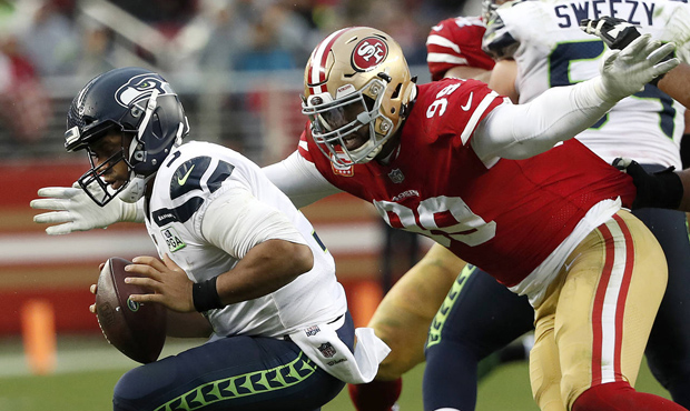 Russell Wilson and the Seahawks couldn't complete a comeback win over the 49ers. (AP)...