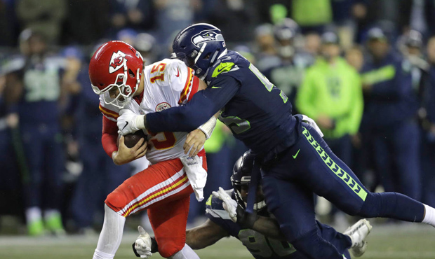 The Seahawks' Frank Clark and Jarran Reed didn't make life easy for Patrick Mahomes. (AP)...