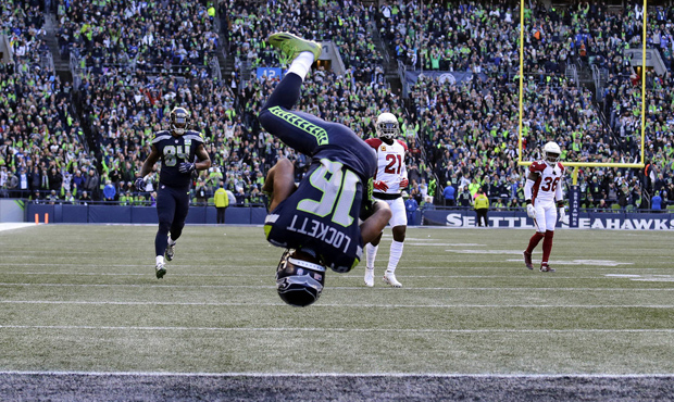 Seahawks WR Tyler Lockett flipped into the end zone on his 29-yard touchdown catch. (AP)...