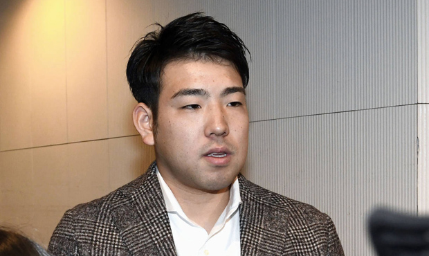 In this Dec. 16, 2018, photo, Japanese baseball player Yusei Kikuchi speaks to journalists before h...