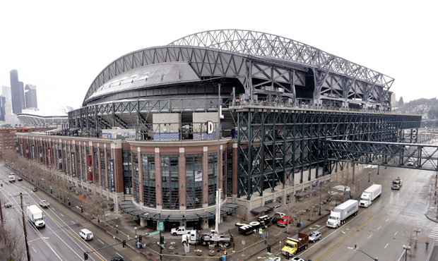 The last letters of "Safeco Field" are removed by a crane over the home plate entrance of the Seatt...