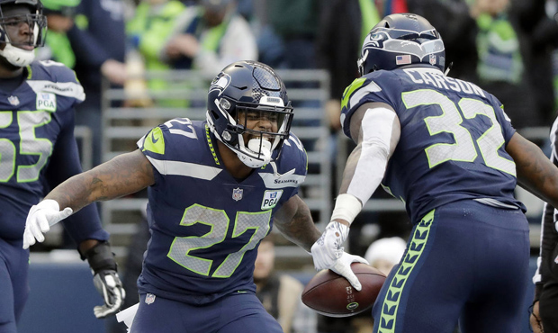 Mike Davis rushed for career-highs in total yards and touchdowns for the Seahawks in 2018. (AP)...