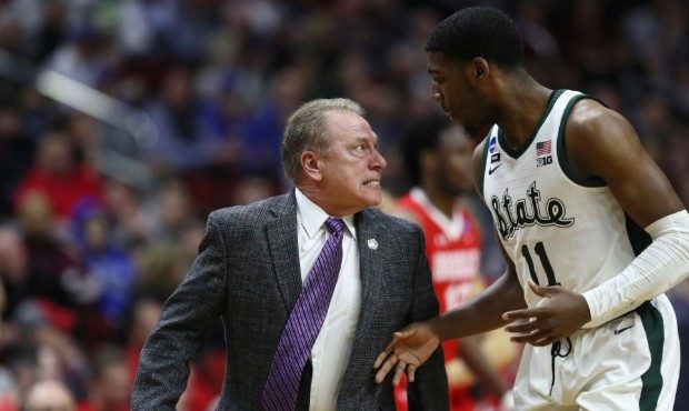Cameras showed an intense exhanged between Michigan State's Tom Izzo and Aaron Henry. (Getty)...