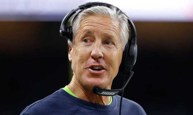 Seahawks coach Pete Carroll is 67 and not afraid to take his shirt off. (AP)...