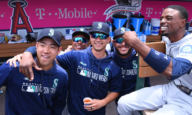 The Mariners were all happy for Yusei Kikuchi after he earned his first MLB win Saturday. (Getty)...