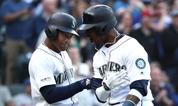 The Mariners scored five runs or more in each of their first seven games. (Getty)...