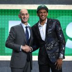 UW Huskies wing Matisse Thybulle poses with NBA Commissioner Adam Silver after being drafted with the 20th overall pick by the Boston Celtics during the 2019 NBA Draft at the Barclays Center on June 20, 2019 in the Brooklyn borough of New York City. (Photo by Sarah Stier/Getty Images)