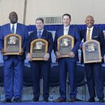 Inductees (from left) Harold Baines, Lee Smith, Edgar Martinez, Mike Mussina, Mariano Rivera and Brandy Halladay, wife the late Roy Halladay, pose with their plaques during the Baseball Hall of Fame induction ceremony at Clark Sports Center on July 21, 2019 in Cooperstown, New York. (Photo by Jim McIsaac/Getty Images)