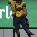 California's Christopher Brown Jr., right, celebrates with Trevon Clark after scoring a touchdown against Washington State in the first half of an NCAA college football game Saturday, Nov. 9, 2019, in Berkeley, Calif. (AP Photo/Ben Margot)