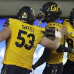 California's Makai Polk, center, celebrates with Michael Saffell (53) and Trevon Clark, right, after scoring a touchdown in the second half of an NCAA college football game against Arizona State, Saturday, Nov. 9, 2019, in Berkeley, Calif. (AP Photo/Ben Margot)