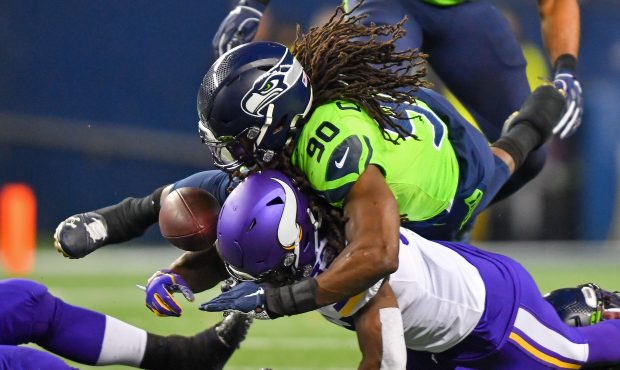 Seahawks DE Jadeveon Clowney forced a fumble and made three tackles while playing hurt. (Getty)...