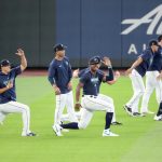 SEATTLE, WASHINGTON - JULY 03: Kyle Lewis #1 of the Seattle Mariners (center) participates in drills alongside teammates during summer workouts at T-Mobile Park on July 03, 2020 in Seattle, Washington. (Photo by Abbie Parr/Getty Images)