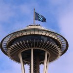 SEATTLE, WASHINGTON - JULY 23: A general view of the Space Needle as the Seattle Kraken team flag is hung from above on July 23, 2020 in Seattle, Washington. The NHL revealed the franchise's new team name today.  (Photo by Abbie Parr/Getty Images)
