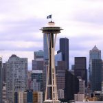 SEATTLE, WASHINGTON - JULY 23: A general view of the Seattle skyline as the Seattle Kraken team flag is hung from the Space Needle on July 23, 2020 in Seattle, Washington. The NHL revealed the franchise's new team name today.  (Photo by Abbie Parr/Getty Images)