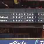SEATTLE, WASHINGTON - JULY 31: A general view of the stadium scoreboard with a message promoting health and safety due to the COVID-19 pandemic prior to an Opening Day game between the Seattle Mariners and Oakland Athletics at T-Mobile Park on July 31, 2020 in Seattle, Washington. (Photo by Abbie Parr/Getty Images)