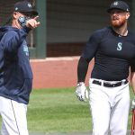 SEATTLE, WASHINGTON - JULY 03: Seattle Mariners Manager Scott Servais (L) has a conversation with Jake Fraley #8 of the Seattle Mariners during summer workouts at T-Mobile Park on July 03, 2020 in Seattle, Washington. (Photo by Abbie Parr/Getty Images)