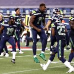 SEATTLE, WASHINGTON - SEPTEMBER 20: DK Metcalf #14 of the Seattle Seahawks celebrates with teammates after defeating the New England Patriots 35-30 at CenturyLink Field on September 20, 2020 in Seattle, Washington. (Photo by Abbie Parr/Getty Images)