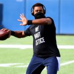 SEATTLE, WASHINGTON - SEPTEMBER 27: Russell Wilson #3 of the Seattle Seahawks warms up prior to the game against the Dallas Cowboys at CenturyLink Field on September 27, 2020 in Seattle, Washington. (Photo by Abbie Parr/Getty Images)