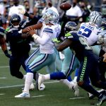 SEATTLE, WASHINGTON - SEPTEMBER 27: Dak Prescott #4 of the Dallas Cowboys fumbles the ball against the Seattle Seahawks during the third quarter in the game at CenturyLink Field on September 27, 2020 in Seattle, Washington. (Photo by Abbie Parr/Getty Images)