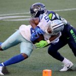 SEATTLE, WASHINGTON - SEPTEMBER 27: Noah Brown #85 of the Dallas Cowboys fails to score the two point conversion against Ugo Amadi #28 of the Seattle Seahawks during the fourth quarter in the game at CenturyLink Field on September 27, 2020 in Seattle, Washington. (Photo by Abbie Parr/Getty Images)