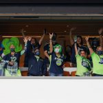 MIAMI GARDENS, FLORIDA - OCTOBER 04: Seattle Seahawks fans cheer from a suite prior to the game between the Miami Dolphins and the Seattle Seahawks at Hard Rock Stadium on October 04, 2020 in Miami Gardens, Florida. (Photo by Michael Reaves/Getty Images)