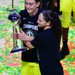 PALMETTO, FLORIDA - OCTOBER 06: Breanna Stewart #30 and Sue Bird #10 of the Seattle Storm pose with the Championship trophy after defeating the Las Vegas Aces 92-59 in Game 3 of the WNBA Finals at Feld Entertainment Center on October 06, 2020 in Palmetto, Florida. NOTE TO USER: User expressly acknowledges and agrees that, by downloading and or using this photograph, User is consenting to the terms and conditions of the Getty Images License Agreement. (Photo by Julio Aguilar/Getty Images)